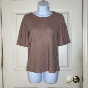 Pink shirt with ruffle sleeves